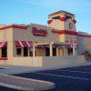 Restaurant exterior with striped awnings