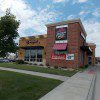 Sidewalk view of a fast-food place
